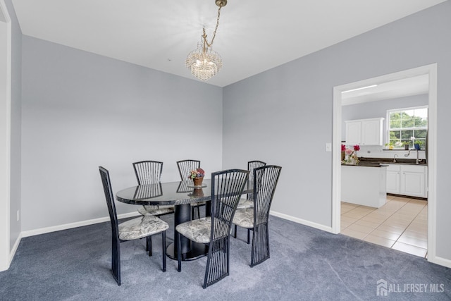 6 Garretson Dr, Franklin, NJ 08823 - dining room featuring light colored carpet, a chandelier, baseboards, and light tile patterned floors