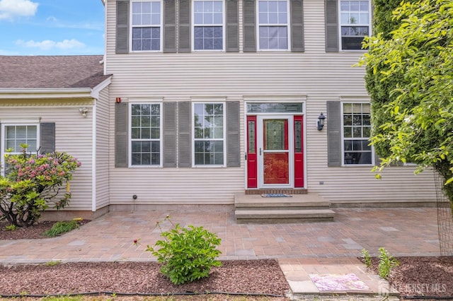 6 Garretson Dr, Franklin, NJ 08823 - view of exterior entry with a patio