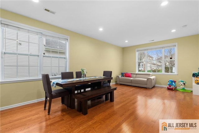 dining room featuring visible vents, recessed lighting, light wood-style flooring, and baseboards