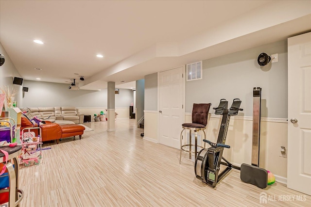 workout room with recessed lighting