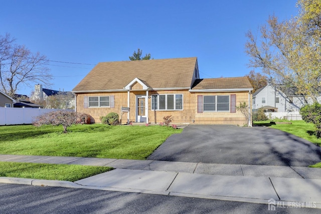 view of front of home with a front lawn