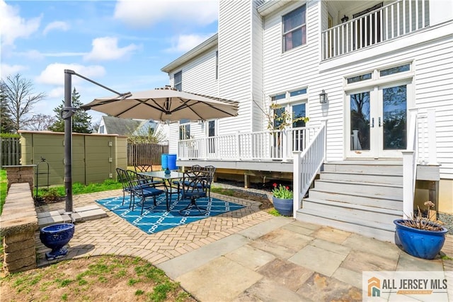 11 Hilltop Blvd N, East Brunswick, NJ 08816 - view of patio / terrace featuring french doors, outdoor dining area, and a deck