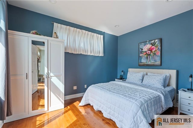 11 Hilltop Blvd N, East Brunswick, NJ 08816 - bedroom featuring wood finished floors, baseboards, and recessed lighting