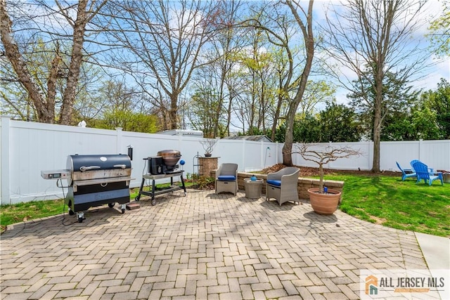 11 Hilltop Blvd N, East Brunswick, NJ 08816 - fenced backyard with a patio area and grilling area