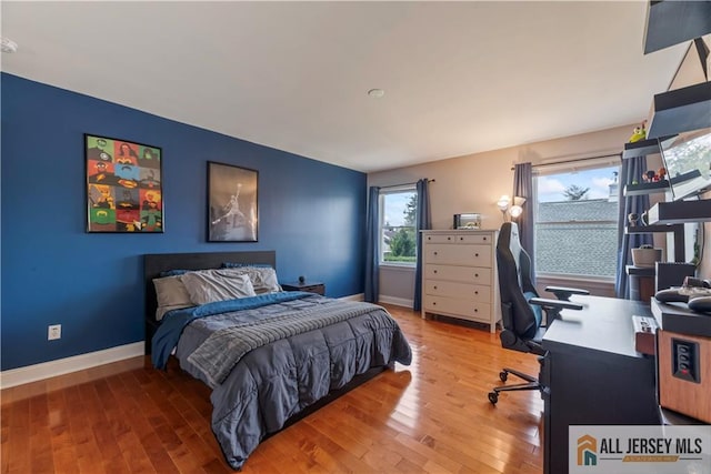 11 Hilltop Blvd N, East Brunswick, NJ 08816 - bedroom featuring an office area, wood finished floors, and baseboards