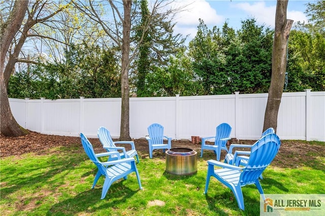 11 Hilltop Blvd N, East Brunswick, NJ 08816 - view of yard featuring an outdoor fire pit