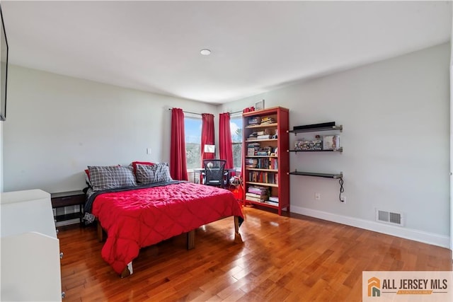 11 Hilltop Blvd N, East Brunswick, NJ 08816 - bedroom featuring wood finished floors and baseboards
