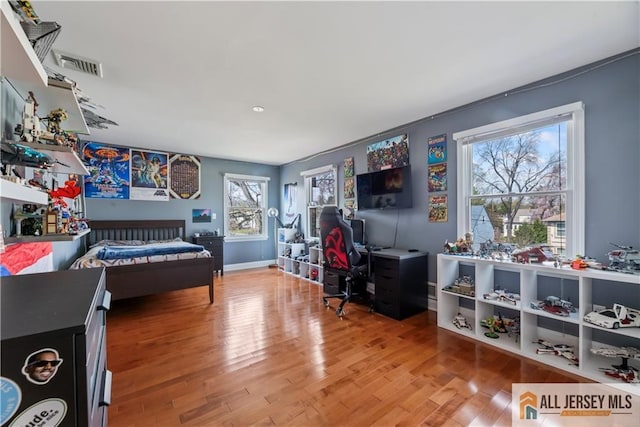 11 Hilltop Blvd N, East Brunswick, NJ 08816 - bedroom featuring wood finished floors, a desk, and baseboards