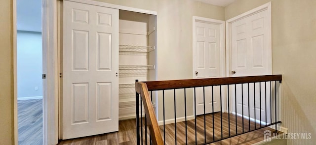 2003 Timber Oaks Rd, Edison, NJ 08820 - hallway featuring wood finished floors and baseboards