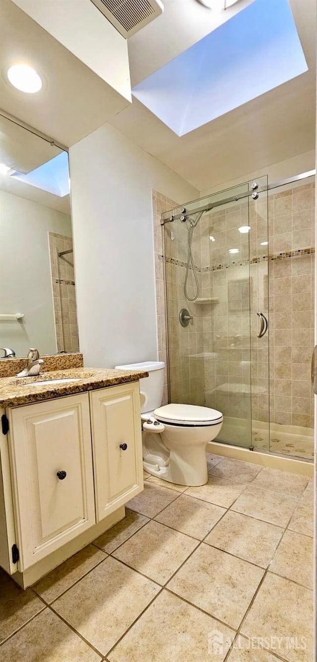 2003 Timber Oaks Rd, Edison, NJ 08820 - full bathroom featuring a shower stall, vanity, and tile patterned floors