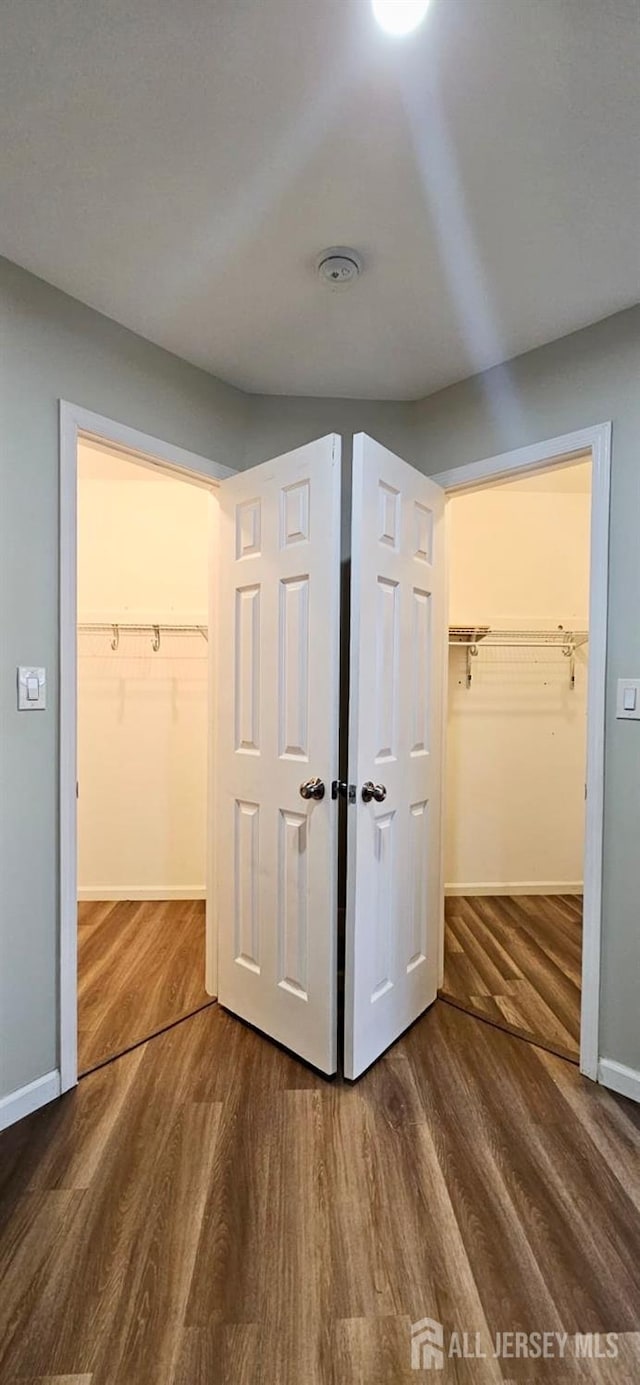 2003 Timber Oaks Rd, Edison, NJ 08820 - unfurnished bedroom with a walk in closet, wood finished floors, and a closet