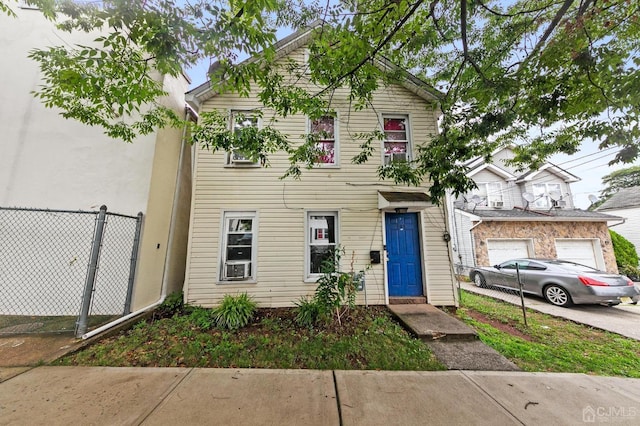 view of front of property featuring a garage