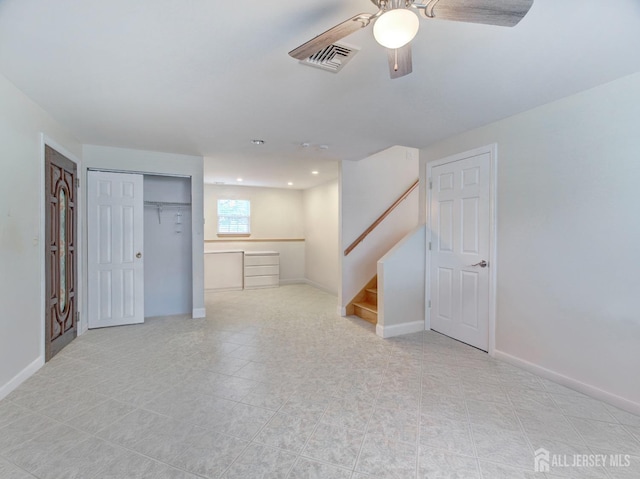 interior space with ceiling fan, recessed lighting, visible vents, baseboards, and stairway