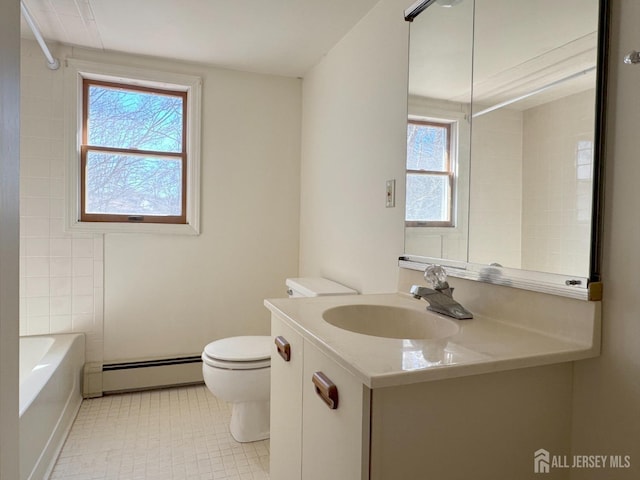 bathroom featuring toilet, a washtub, tile patterned flooring, a baseboard radiator, and vanity