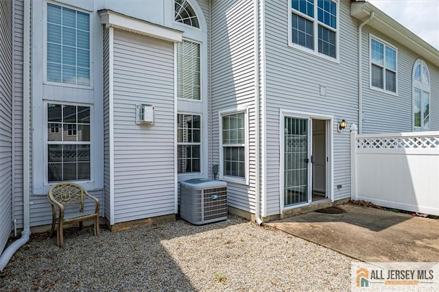 1804 Pheasant Run, South Brunswick, NJ 08852 - back of property featuring cooling unit and a patio area