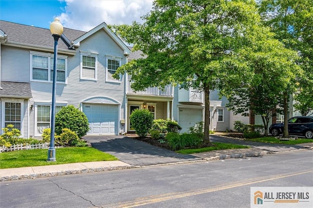 1804 Pheasant Run, South Brunswick, NJ 08852 - view of property with an attached garage, driveway, and a shingled roof