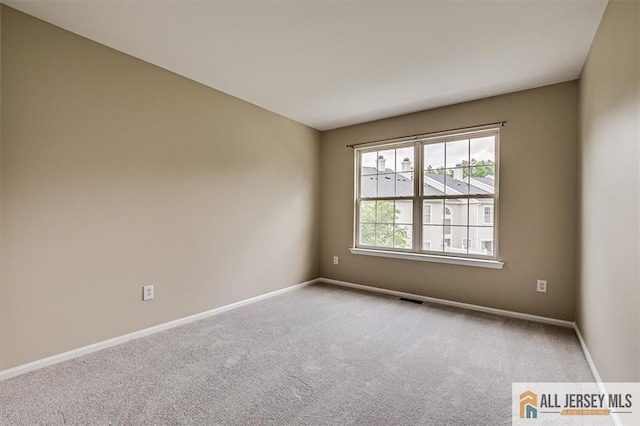 1804 Pheasant Run, South Brunswick, NJ 08852 - carpeted spare room featuring baseboards