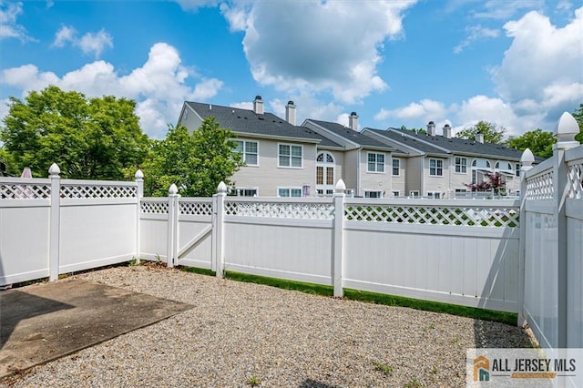 1804 Pheasant Run, South Brunswick, NJ 08852 - back of house featuring a fenced backyard, a residential view, and a gate