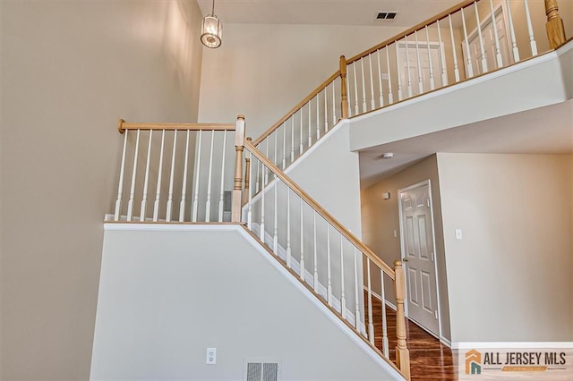 1804 Pheasant Run, South Brunswick, NJ 08852 - staircase with a high ceiling and wood finished floors