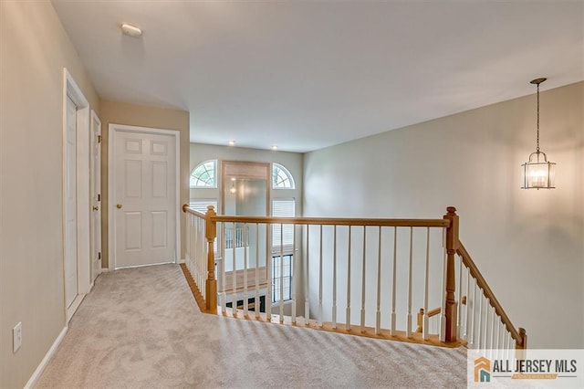1804 Pheasant Run, South Brunswick, NJ 08852 - hall with an upstairs landing, carpet floors, and baseboards