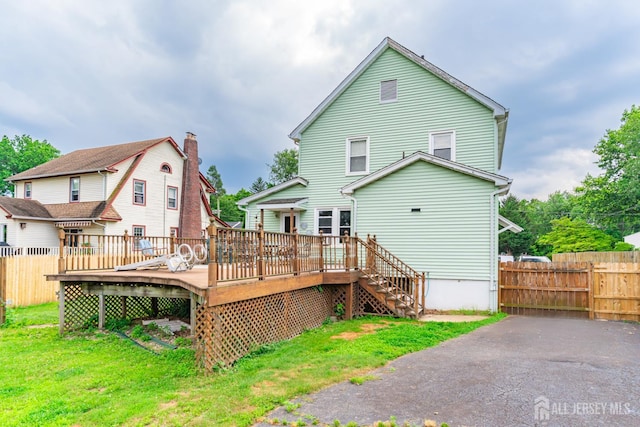 139 Palmer Ave, South Plainfield, NJ 07080 - back of house featuring a deck and stairs