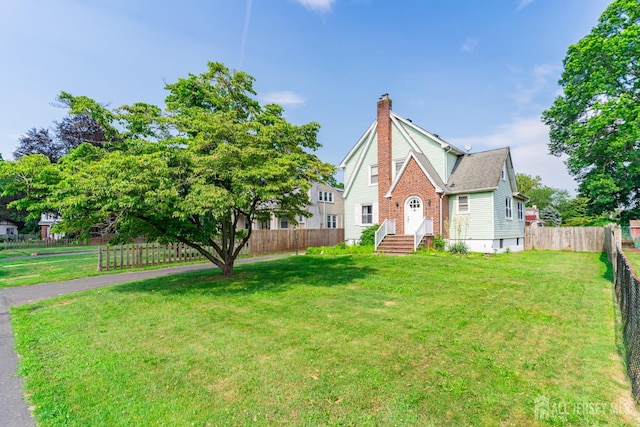 139 Palmer Ave, South Plainfield, NJ 07080 - view of front of home featuring a chimney and brick siding