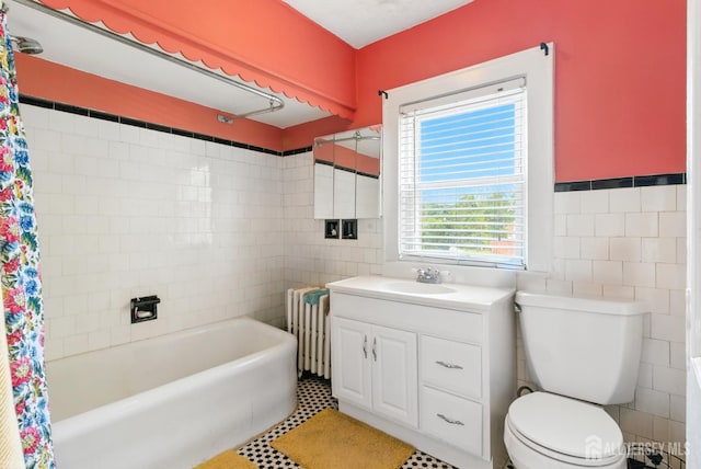 139 Palmer Ave, South Plainfield, NJ 07080 - bathroom featuring radiator heating unit, tile walls, shower / tub combo with curtain, and vanity