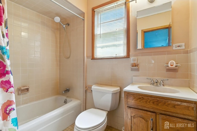 139 Palmer Ave, South Plainfield, NJ 07080 - bathroom featuring shower / bath combo, vanity, and tile walls