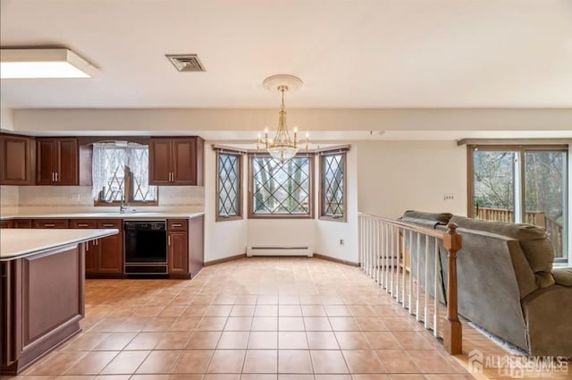 6 Persimmon Ct, East Brunswick, NJ 08816 - kitchen with dishwasher, baseboard heating, light countertops, and plenty of natural light
