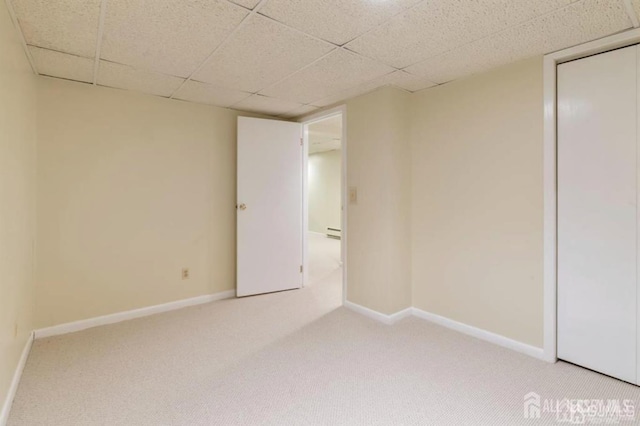 6 Persimmon Ct, East Brunswick, NJ 08816 - carpeted spare room with a baseboard radiator and a drop ceiling