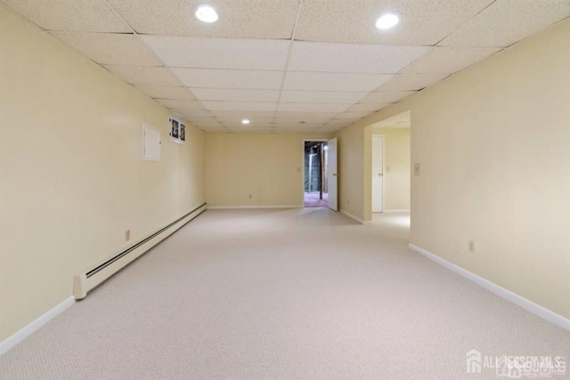 6 Persimmon Ct, East Brunswick, NJ 08816 - unfurnished room with a baseboard heating unit, light colored carpet, recessed lighting, and a paneled ceiling