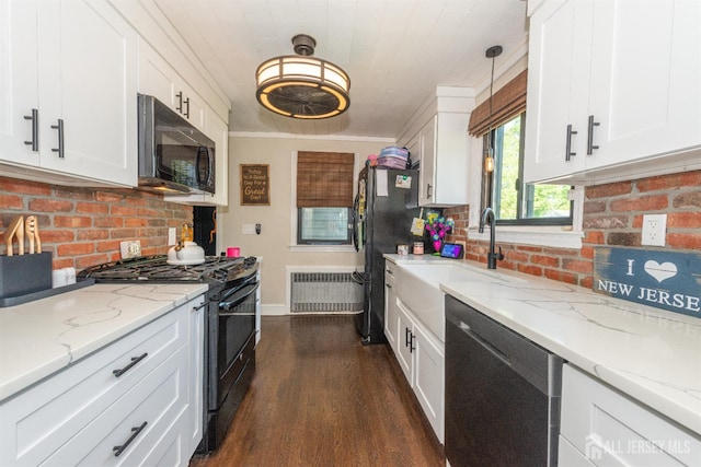 33 Orchard Rd, Middlesex, NJ 08846 - kitchen featuring black appliances, radiator heating unit, dark wood-style floors, white cabinets, and a sink