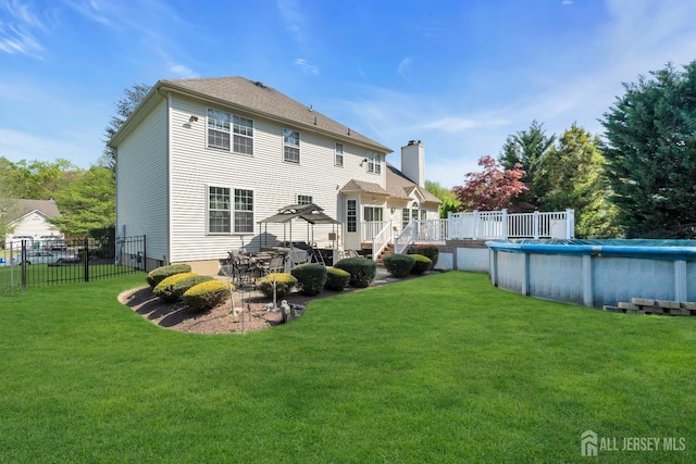 35 Spruce Meadows Dr, Monroe, NJ 08831 - back of house with a wooden deck