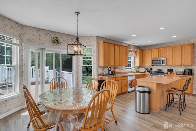 35 Spruce Meadows Dr, Monroe, NJ 08831 - dining room with light wood finished floors, a chandelier, recessed lighting, and wallpapered walls