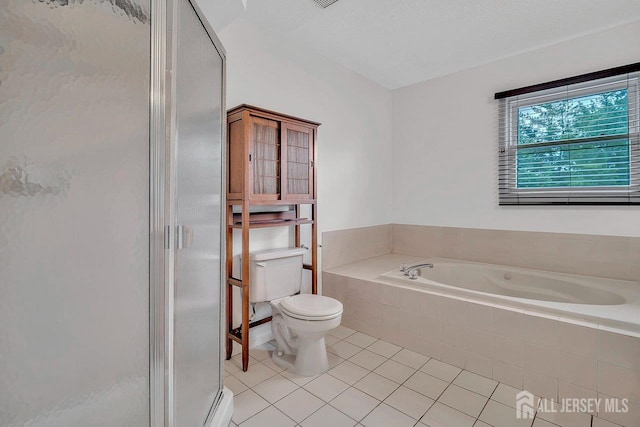 207 Manahan Rd, East Brunswick, NJ 08816 - bathroom featuring tile patterned floors, a garden tub, and a shower stall