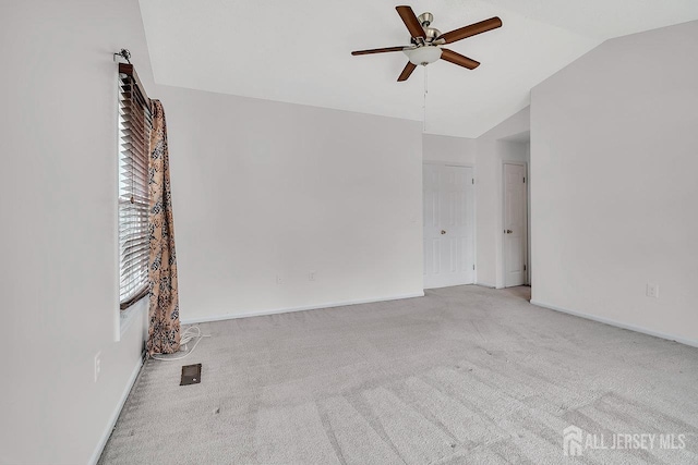207 Manahan Rd, East Brunswick, NJ 08816 - spare room featuring lofted ceiling, a ceiling fan, and carpet