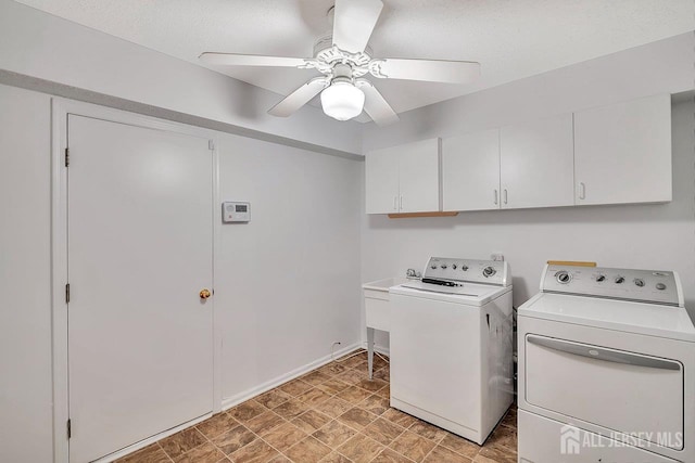 207 Manahan Rd, East Brunswick, NJ 08816 - laundry area featuring cabinet space, washer and clothes dryer, a ceiling fan, and stone finish flooring
