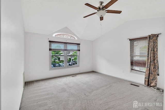 207 Manahan Rd, East Brunswick, NJ 08816 - spare room with ceiling fan, vaulted ceiling, and carpet flooring