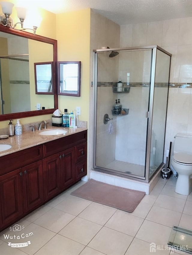 156 Nebula Rd, Piscataway, NJ 08854 - bathroom with tile patterned floors, a shower stall, and double vanity