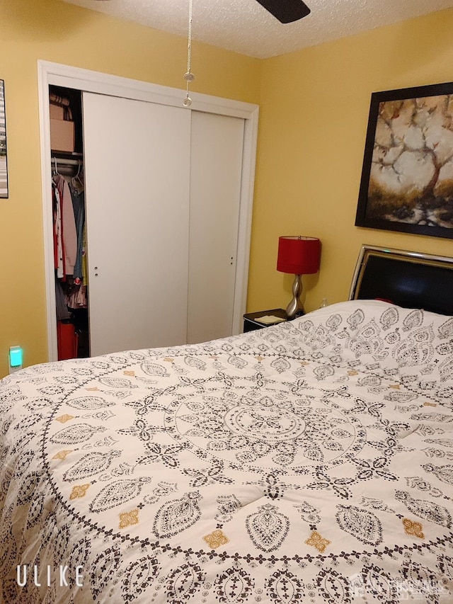 156 Nebula Rd, Piscataway, NJ 08854 - bedroom featuring a closet, a textured ceiling, and a ceiling fan