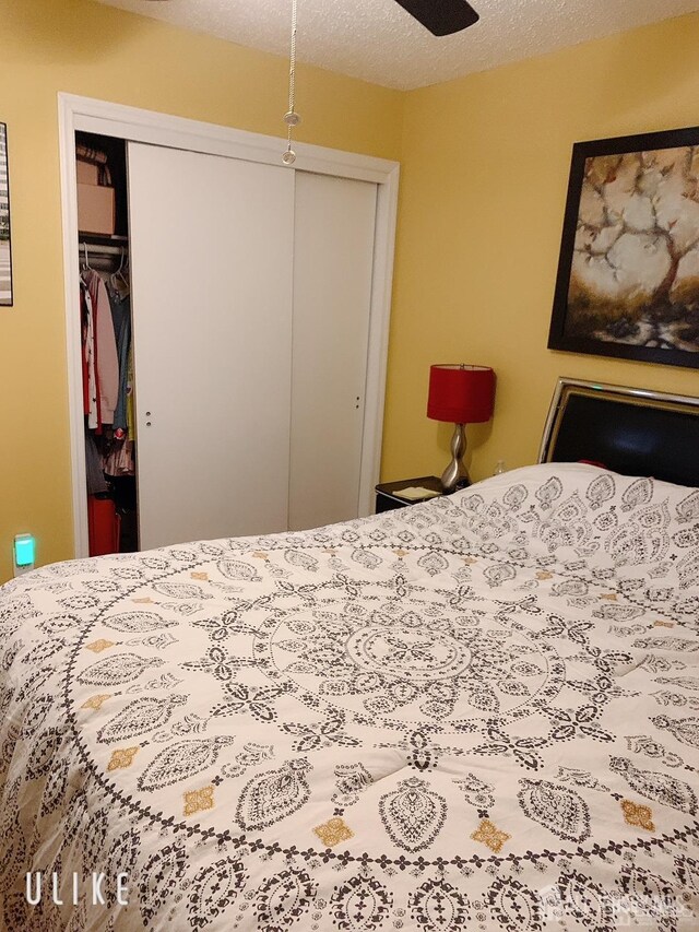156 Nebula Rd, Piscataway, NJ 08854 - bedroom with a closet, a textured ceiling, and ceiling fan