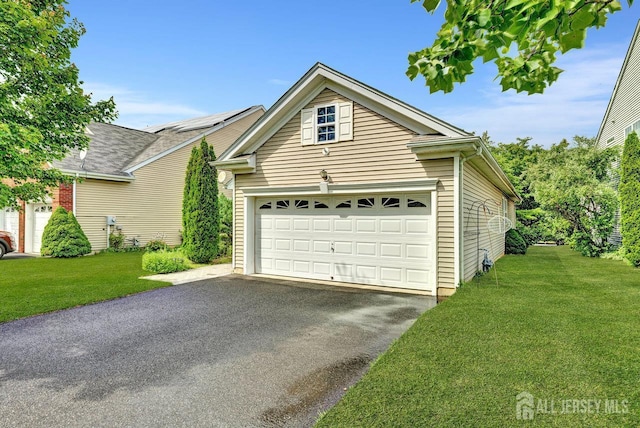 32 Prusakowski Blvd, Sayreville, NJ 08859 - view of front facade with a garage, a front yard, and driveway