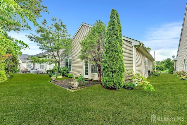 32 Prusakowski Blvd, Sayreville, NJ 08859 - back of house with a yard
