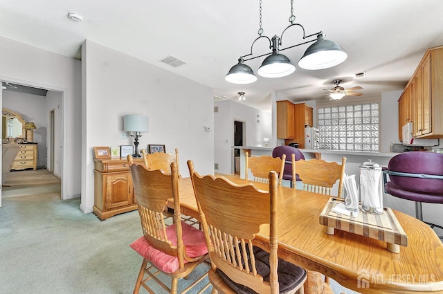 32 Prusakowski Blvd, Sayreville, NJ 08859 - dining space featuring ceiling fan and light carpet