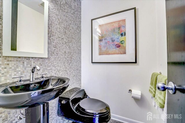 1580 Mountain Top Rd, Bridgewater, NJ 08807 - bathroom with decorative backsplash and a sink