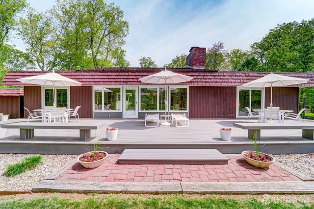 1580 Mountain Top Rd, Bridgewater, NJ 08807 - back of property with outdoor dining area, a wooden deck, and a chimney