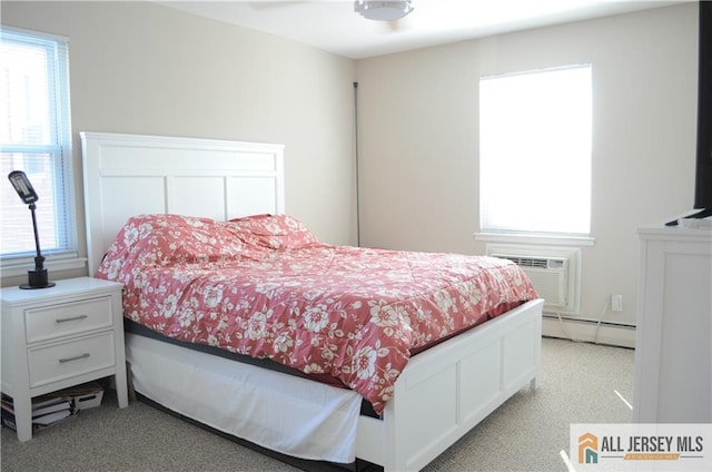 bedroom with light carpet, a wall mounted AC, and baseboard heating