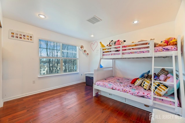 bedroom featuring dark hardwood / wood-style floors