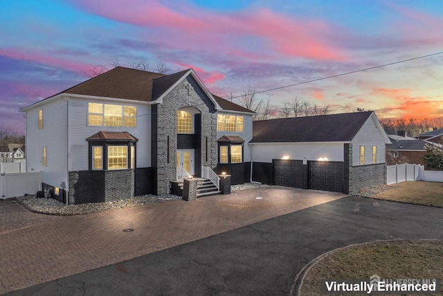 view of front of property with a garage