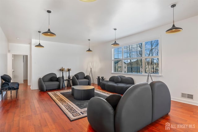 living room with wood-type flooring